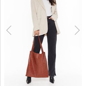 Brand new. Never used Oversized Croc embossed tote